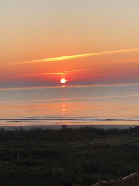 Sunrise-on-surfside-beach